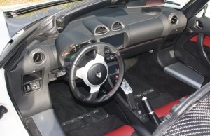 The spartan interior of the Tesla Roadster has everything you need, and nothing you don't.