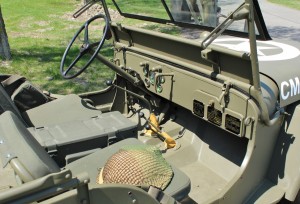 A startan interior was just what the Army ordered. Not custom sheepskin shift boots on this restored example.