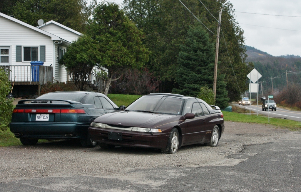 Subaru SVX (times two), spotted near Low, Quebec.