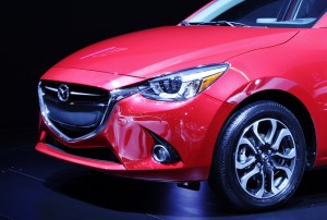 The front end of the 2016 Mazda 2 shows off its new KODO design language.