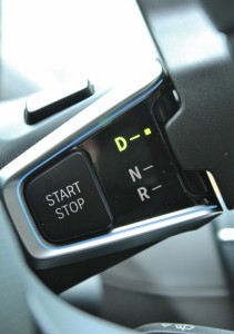 Shifty: a steering column-mounted gearshift uses a button to actuate 'Park'.